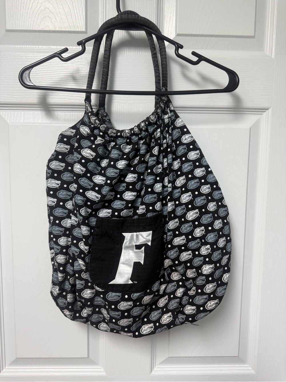 Black Patterned Drawstring Shoulder Bag with Silver 'F' Pocket Accent